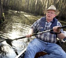 Charlie DeVore, investigator with the Texas Bigfoot Research Center, paddles through a marshy area of Caddo Lake, near where there have been alleged sightings of Bigfoot.