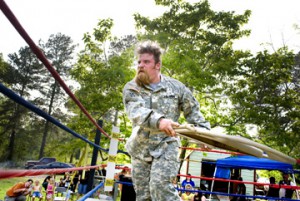 Drew slams somebody with a chair. Photo by Les Hassell.